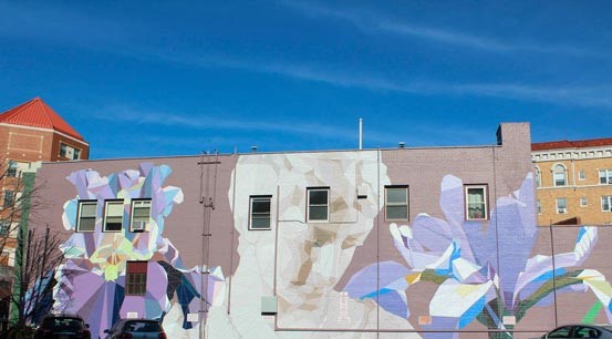A flower mural painted on a brick building near the Acupuncture First clinic, 50 Church Street, Suite L-10, Montclair, NJ